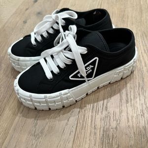 slightly worn prada shoes